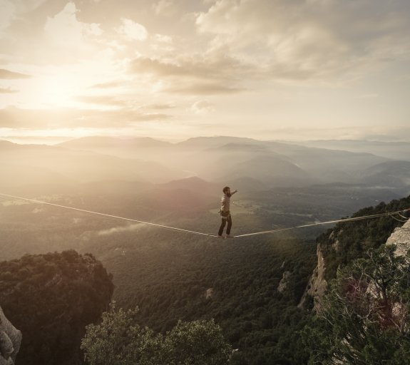 Man highlining in the mountains of Tavertet Catalonia